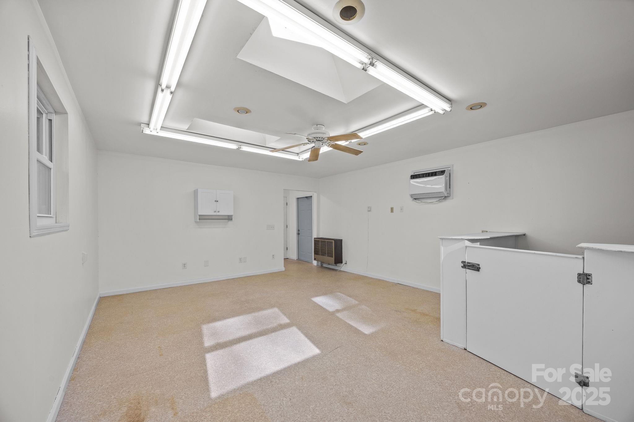 701 Dana Road Hendersonville, NC 28792 - Photo 16 of 27 an empty room with windows