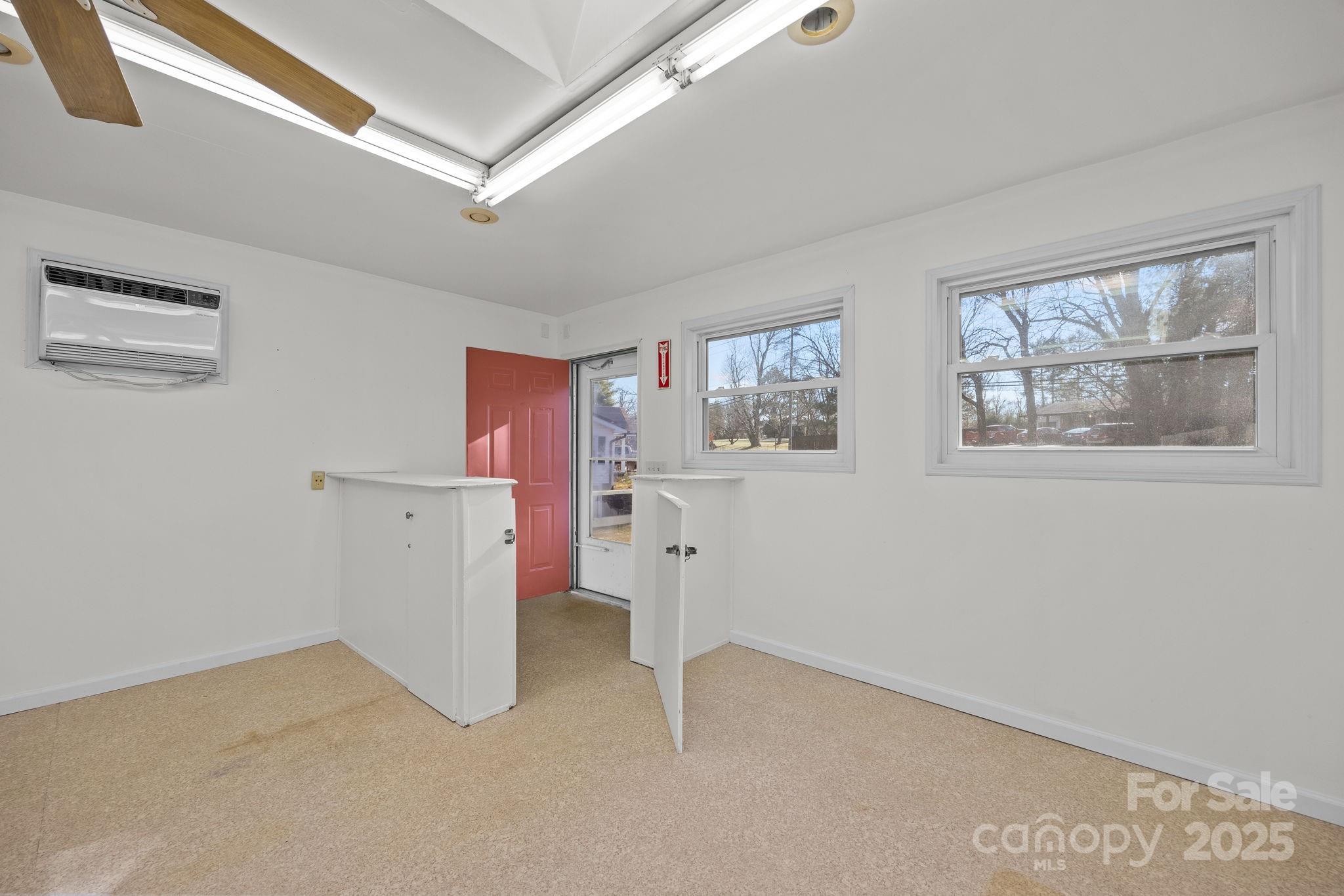701 Dana Road Hendersonville, NC 28792 - Photo 20 of 27 a view of empty room with windows