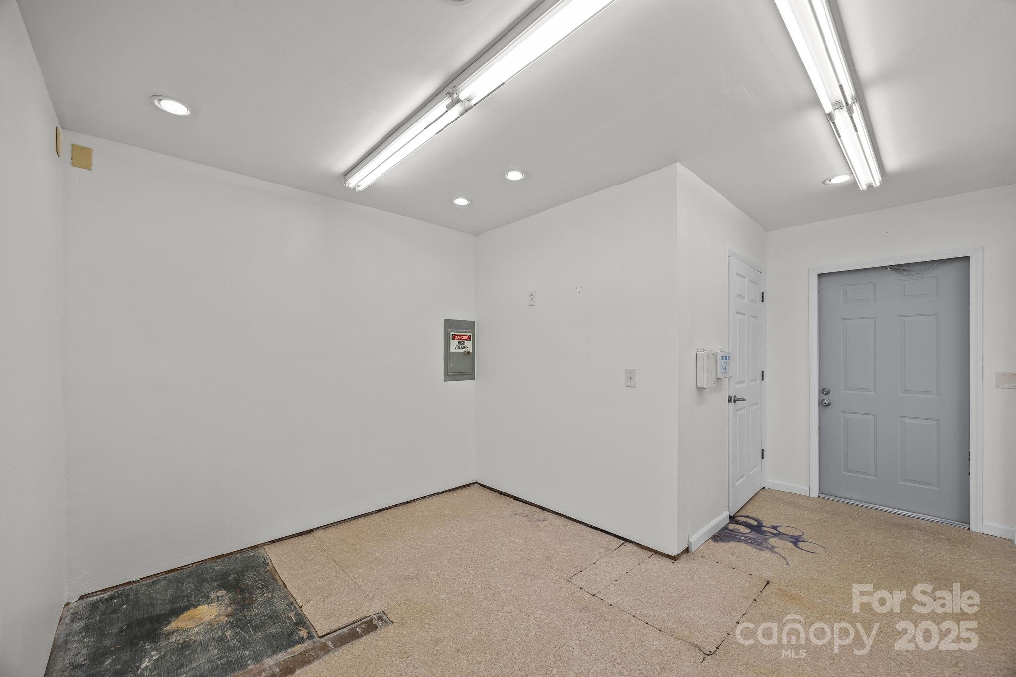 701 Dana Road Hendersonville, NC 28792 - Photo 24 of 27 a view of a room with a hallway