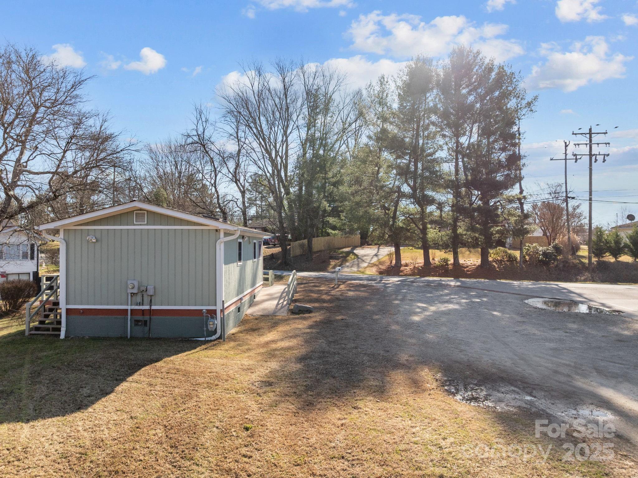701 Dana Road Hendersonville, NC 28792 - Photo 8 of 27 a view of backyard with a large tree