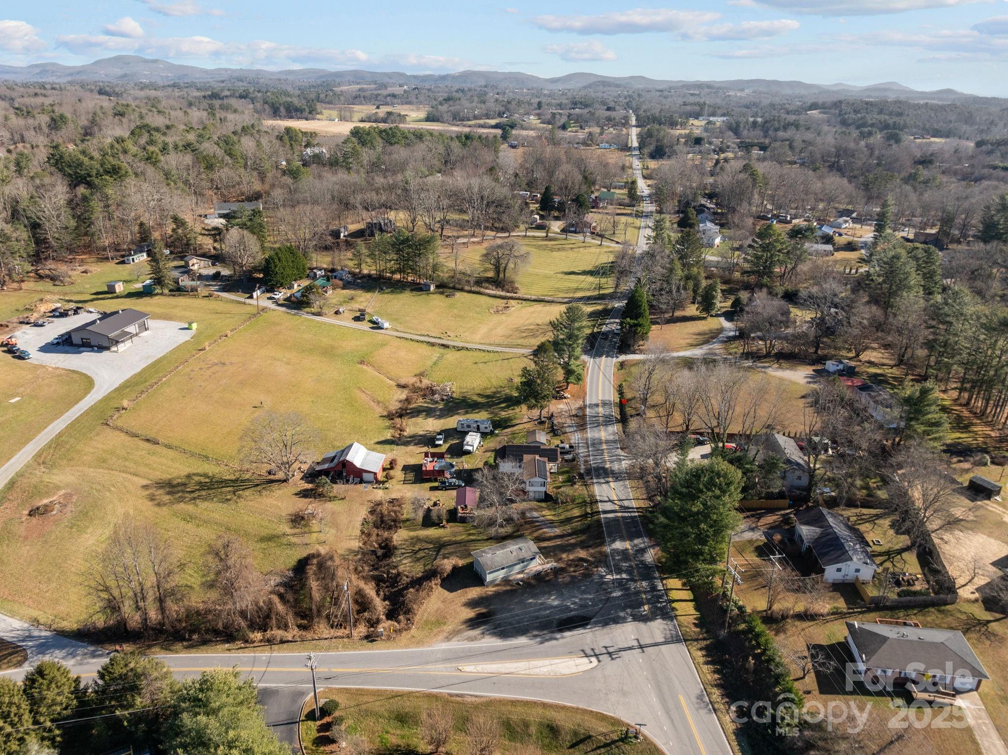 701 Dana Road Hendersonville, NC 28792 - Photo 10 of 27 an aerial view of residential houses with outdoor space
