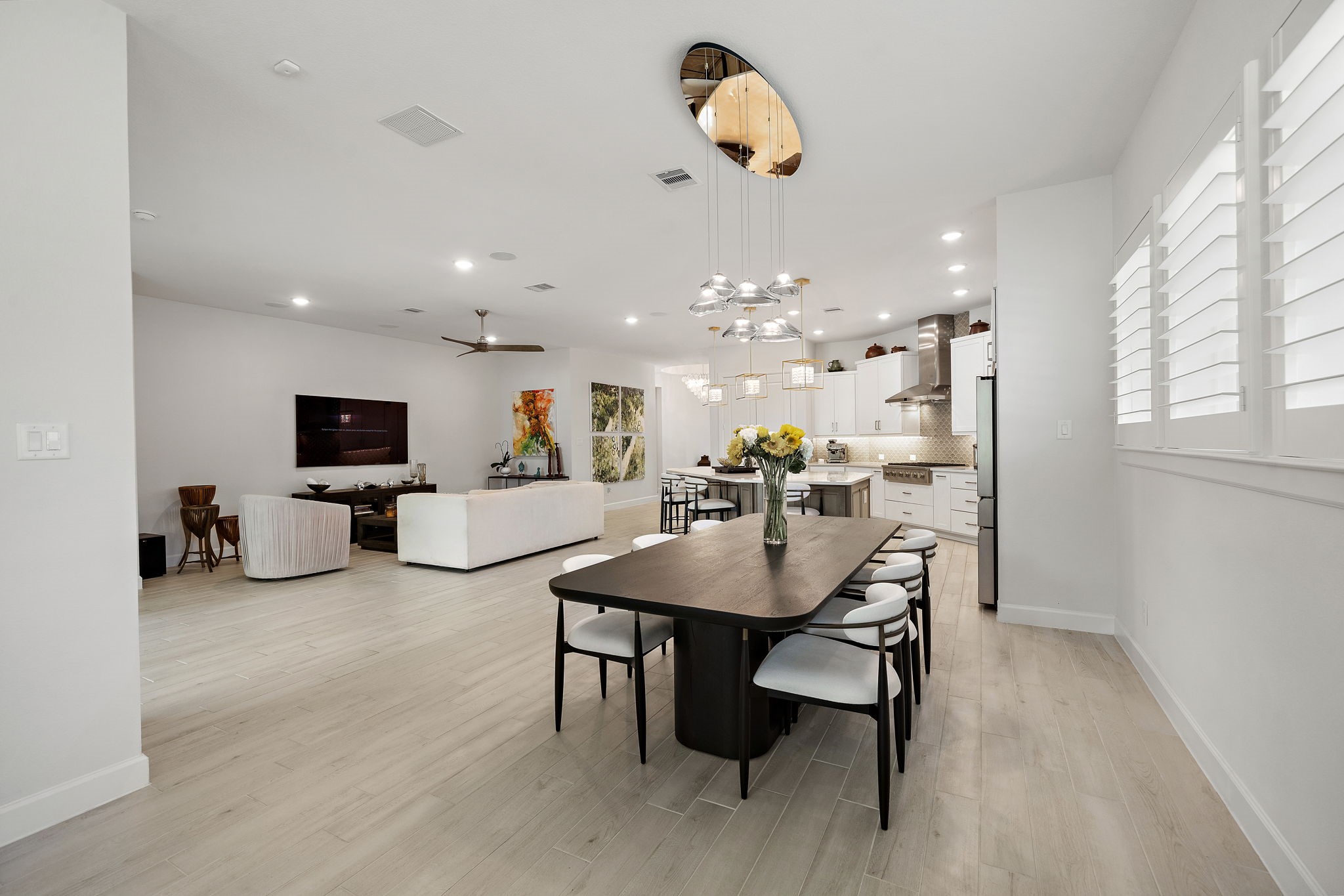 7519 Congress Trl Way Porter, TX 77365 - Photo 14 of 44 a view of a dining room with furniture and wooden floor