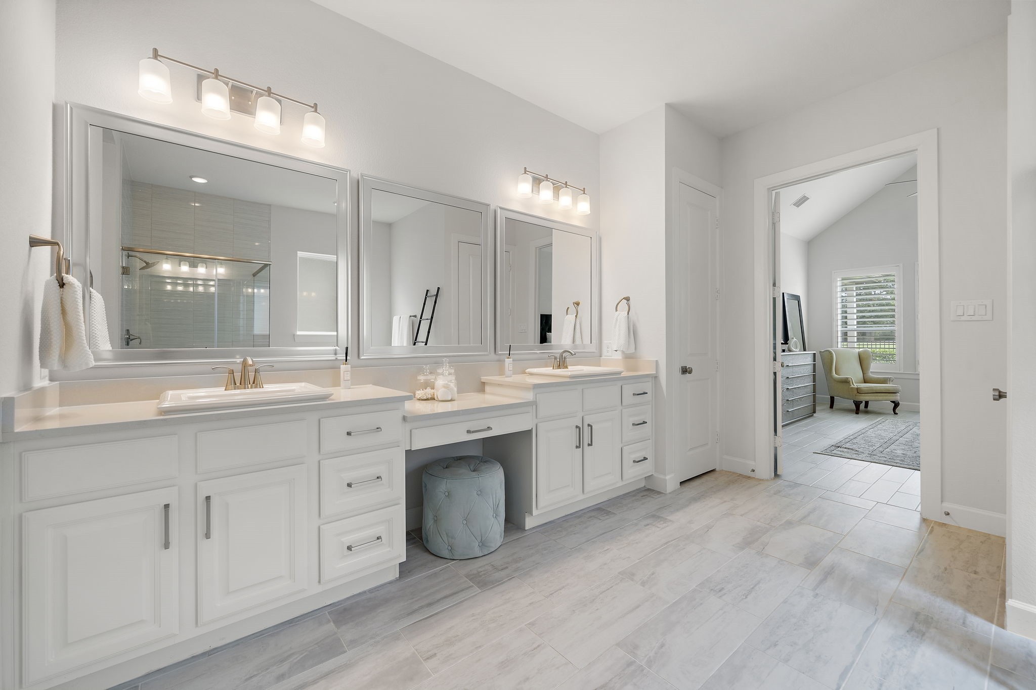 7519 Congress Trl Way Porter, TX 77365 - Photo 21 of 44 a spacious bathroom with a granite countertop sink mirror and a