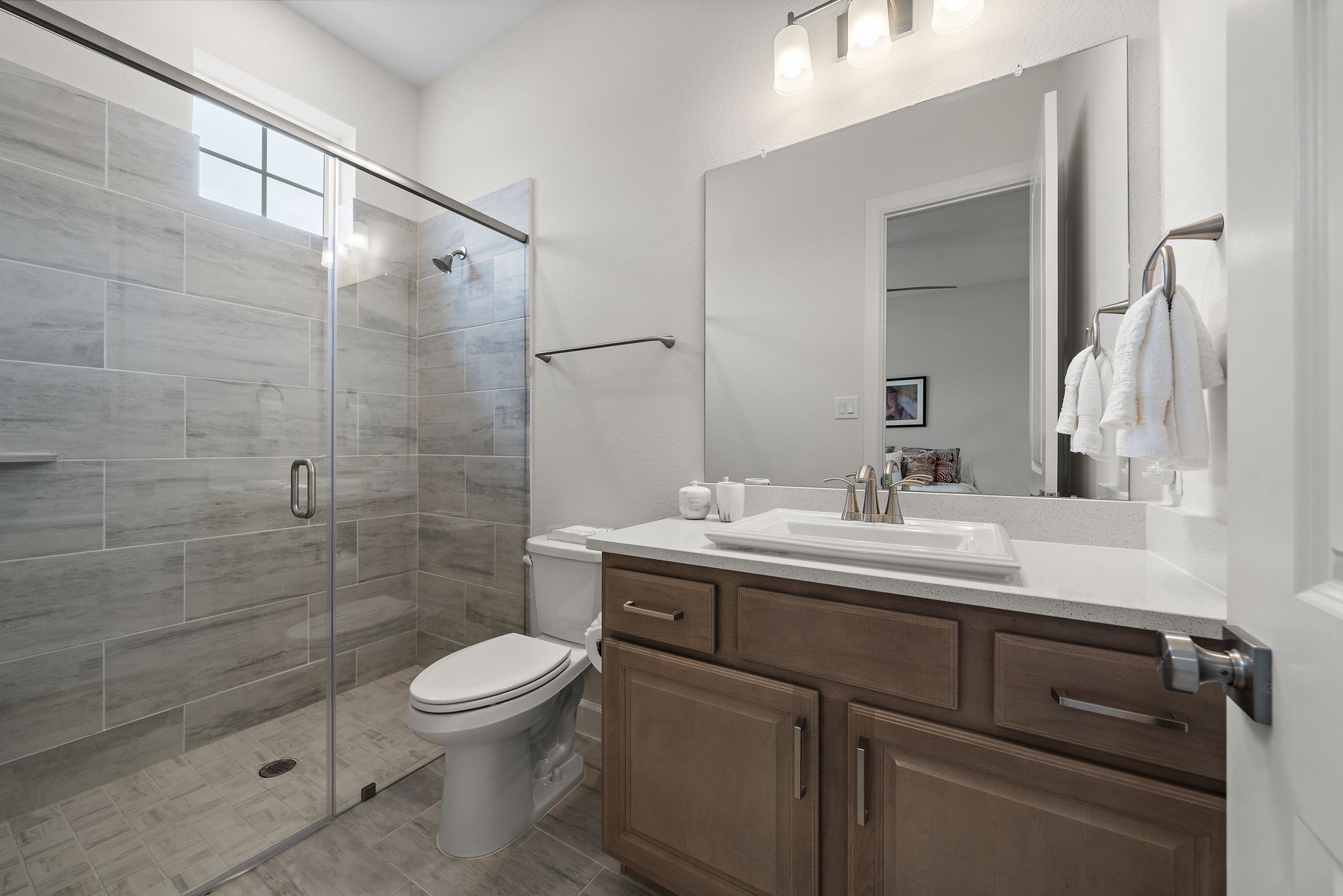 7519 Congress Trl Way Porter, TX 77365 - Photo 24 of 44 a bathroom with a sink toilet and shower