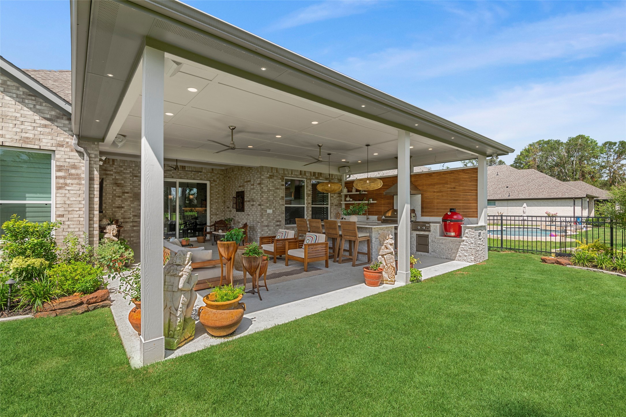 7519 Congress Trl Way Porter, TX 77365 - Photo 32 of 44 a view of a backyard with a patio