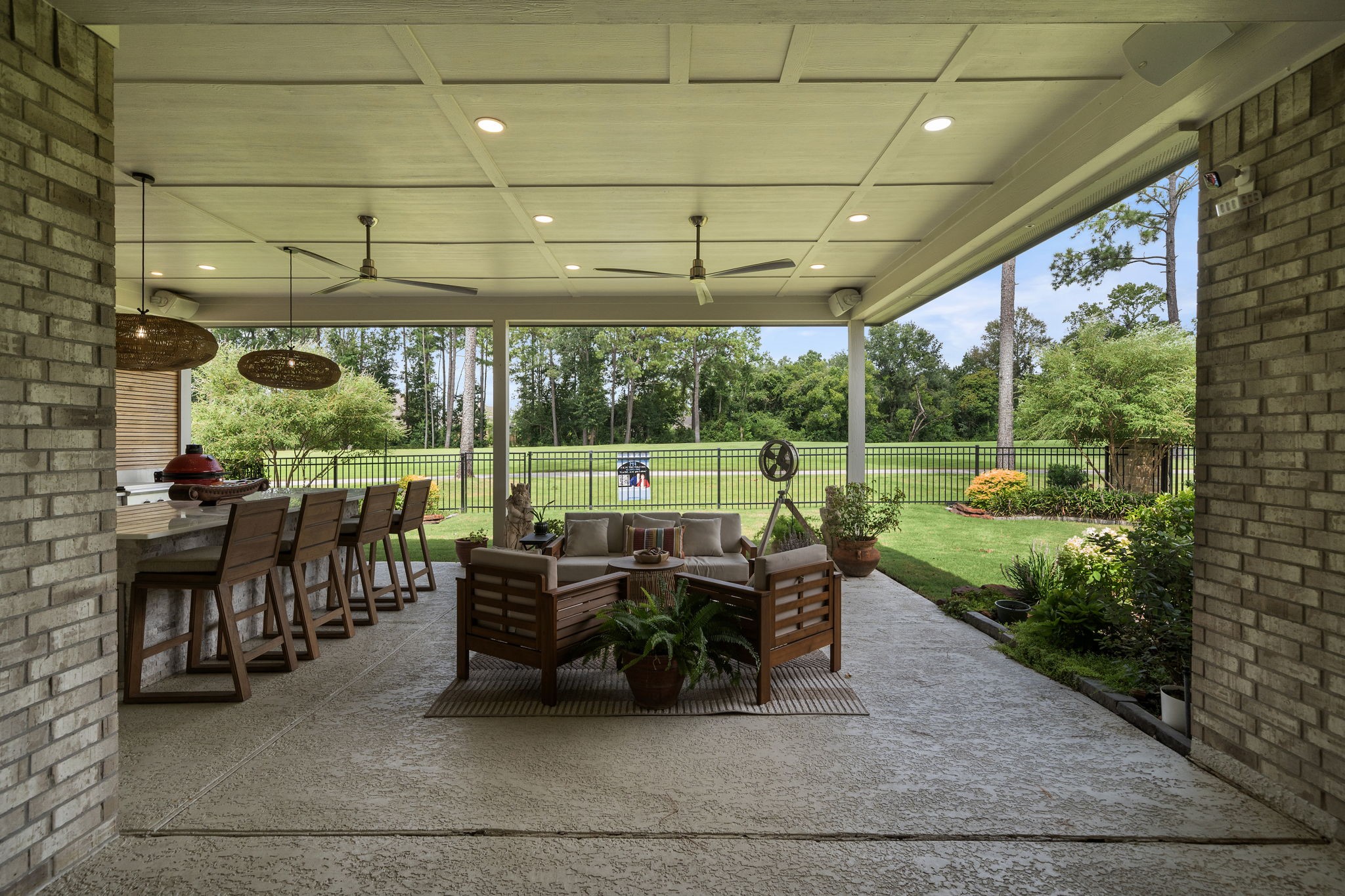 7519 Congress Trl Way Porter, TX 77365 - Photo 36 of 44 a view of a porch with chairs and backyard