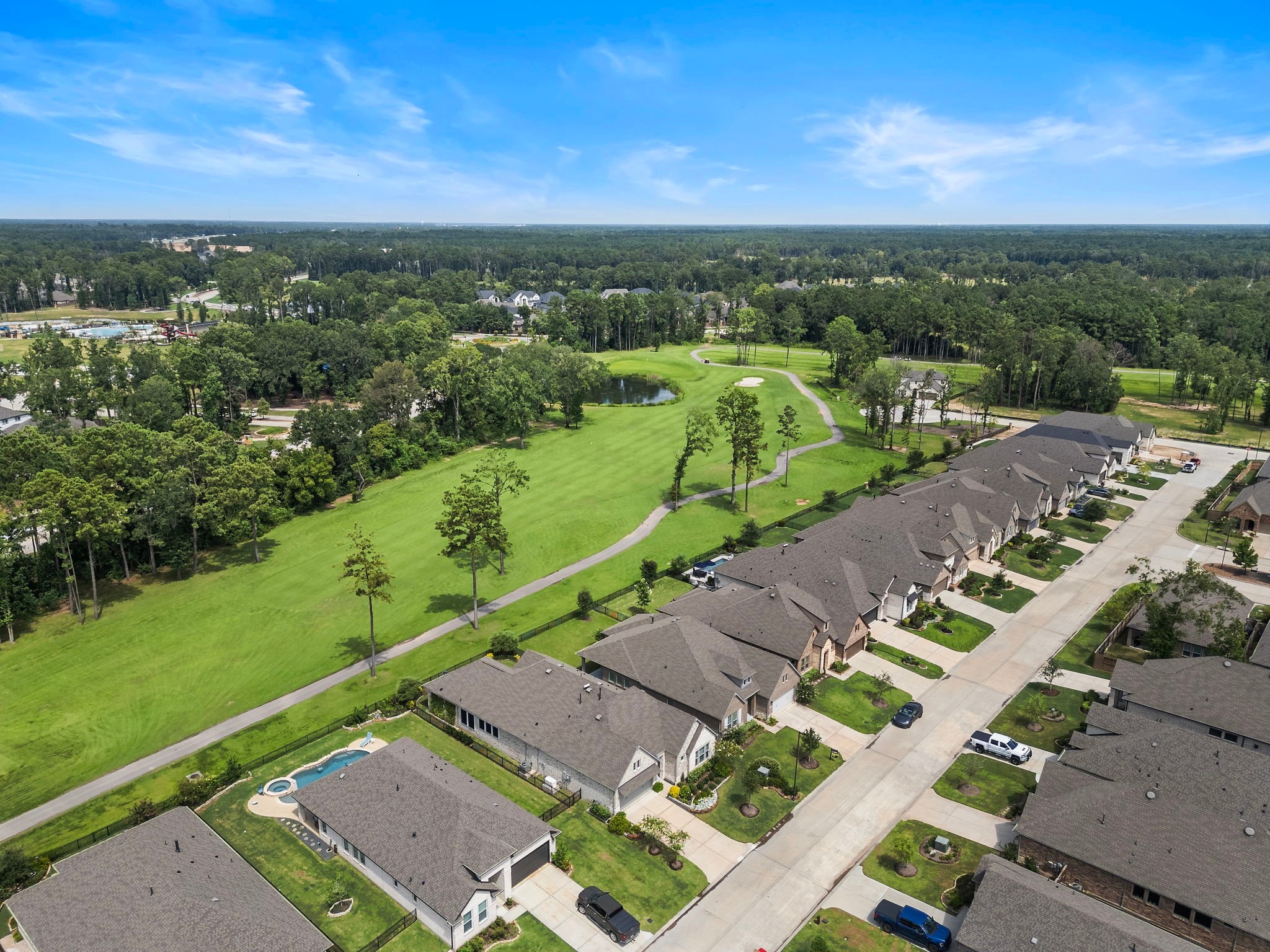 7519 Congress Trl Way Porter, TX 77365 - Photo 40 of 44 a view of a city street view with ocean view