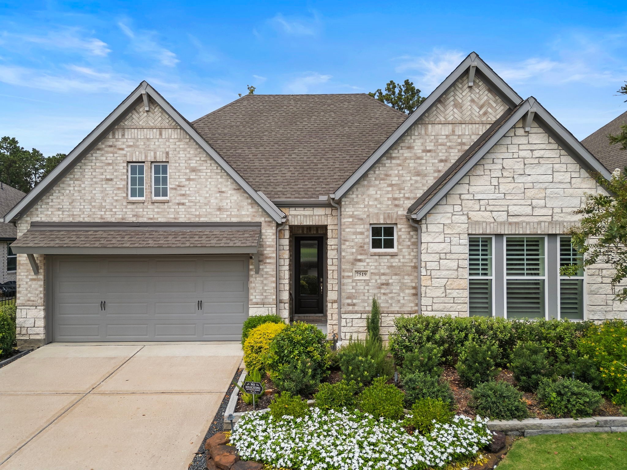7519 Congress Trl Way Porter, TX 77365 - Photo 43 of 44 a front view of a house with a garden