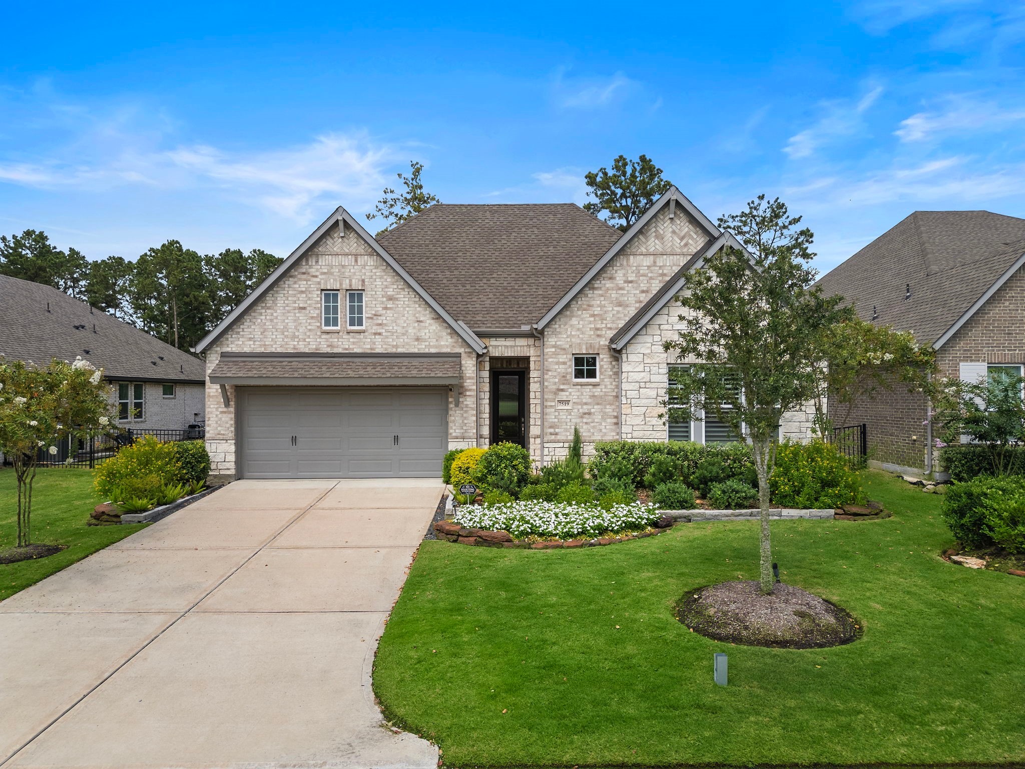 7519 Congress Trl Way Porter, TX 77365 - Photo 44 of 44 a front view of a house with a yard