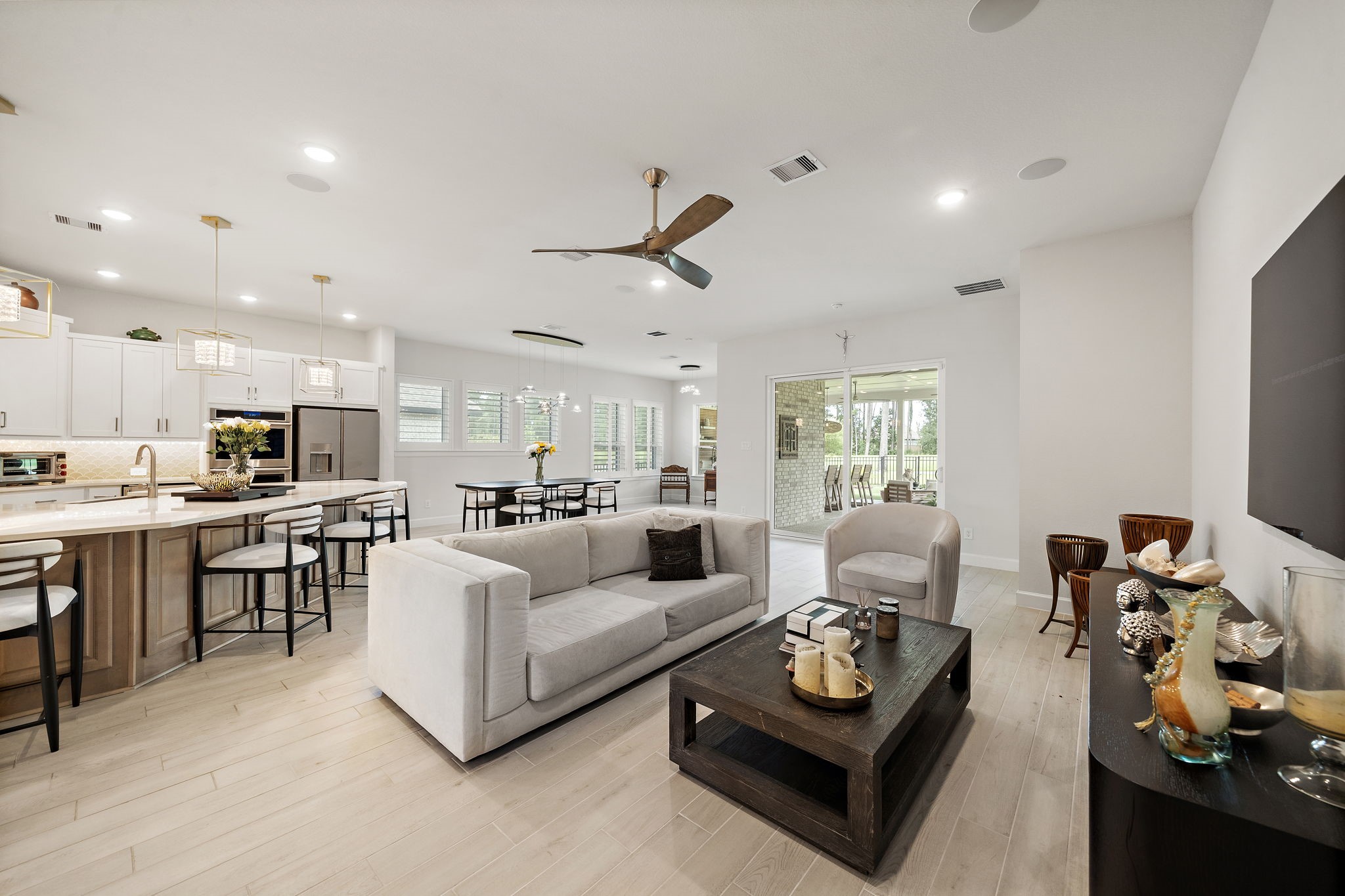 7519 Congress Trl Way Porter, TX 77365 - Photo 7 of 44 a living room with furniture and a flat screen tv