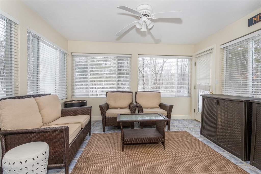 74 Cedarcrest Road Canton, MA 02021 - Photo 13 of 28 a living room with furniture and a large window