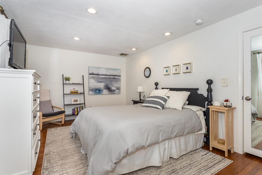 74 Cedarcrest Road Canton, MA 02021 - Photo 14 of 28 a bedroom with a bed and a flat screen tv
