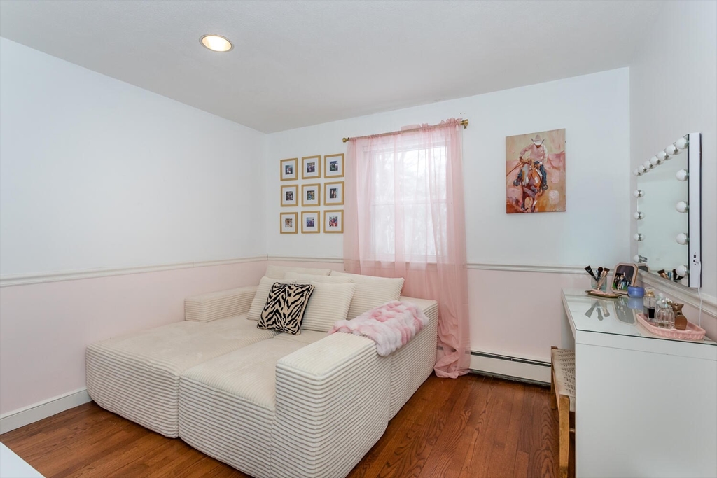 74 Cedarcrest Road Canton, MA 02021 - Photo 19 of 28 a bedroom with a bed and wooden floor