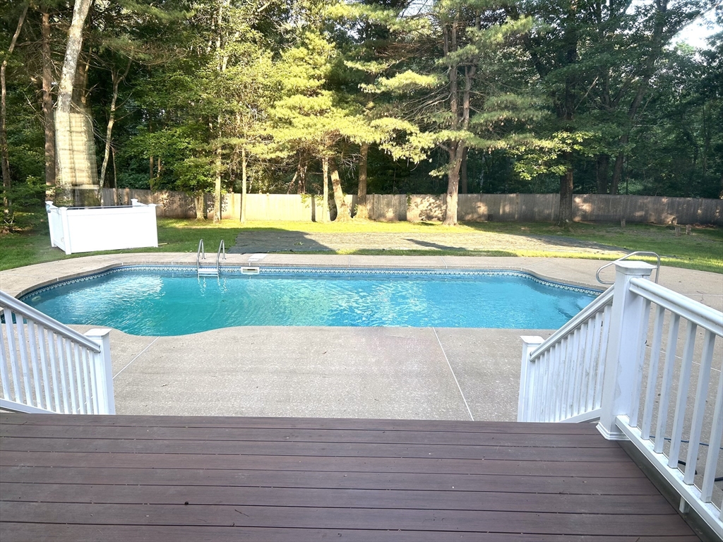 74 Cedarcrest Road Canton, MA 02021 - Photo 28 of 28 a view of a swimming pool with a patio