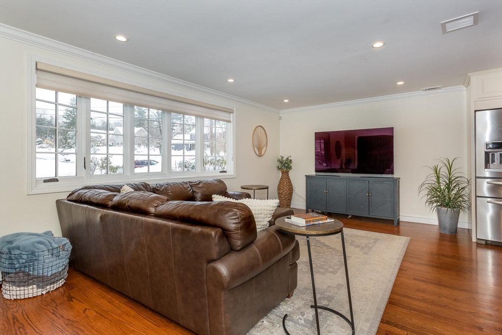 74 Cedarcrest Road Canton, MA 02021 - Photo 4 of 28 a living room with furniture and a flat screen tv