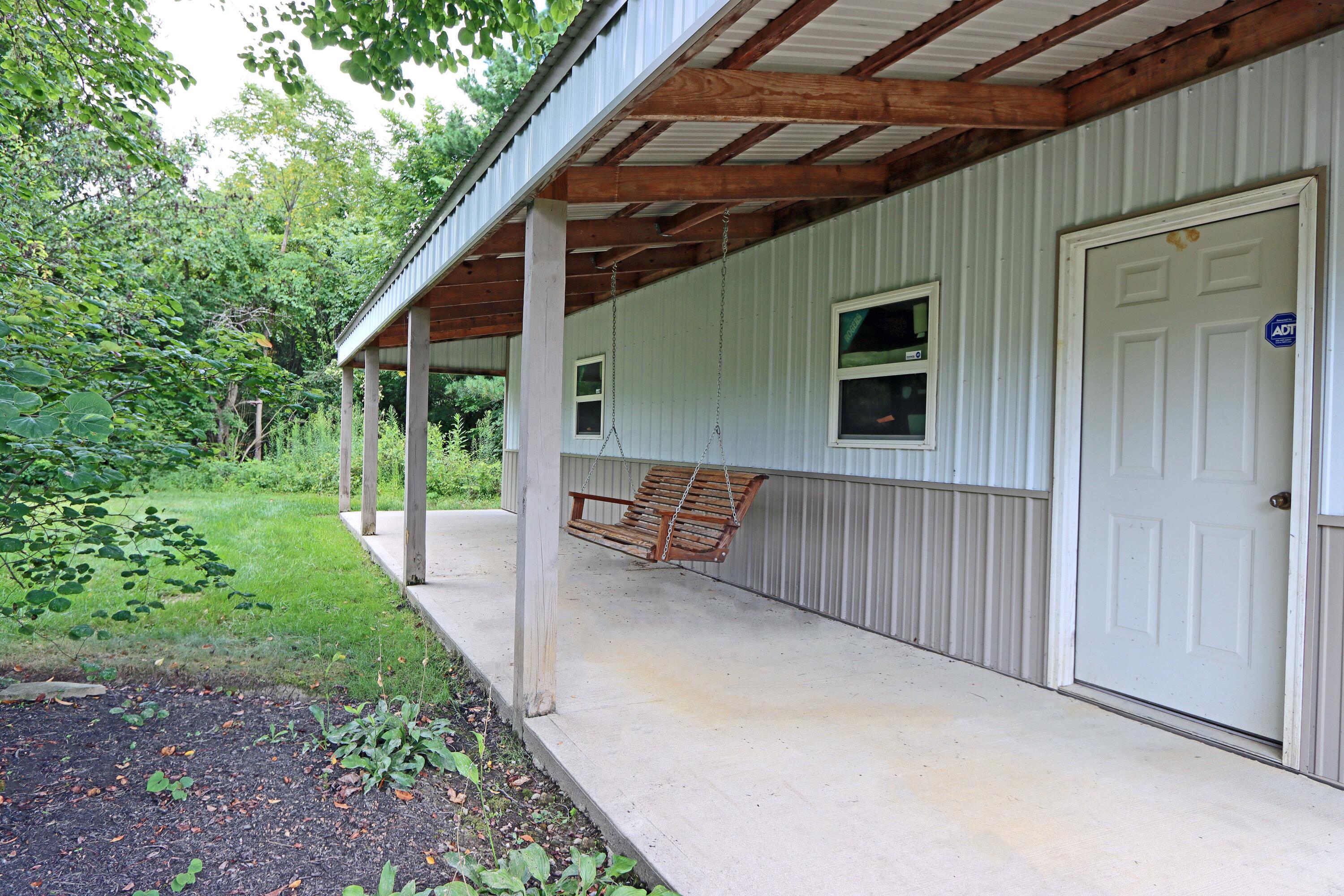 6300 Duffy Road Delaware, OH 43015 - Photo 55 of 62 8x40 Canopy with concrete Patio
