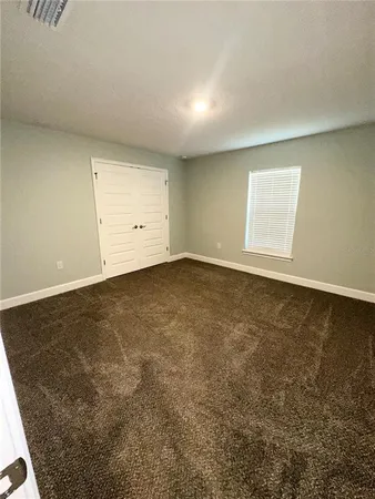 an empty room with a natural light