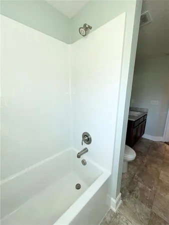 a bathroom with a tub