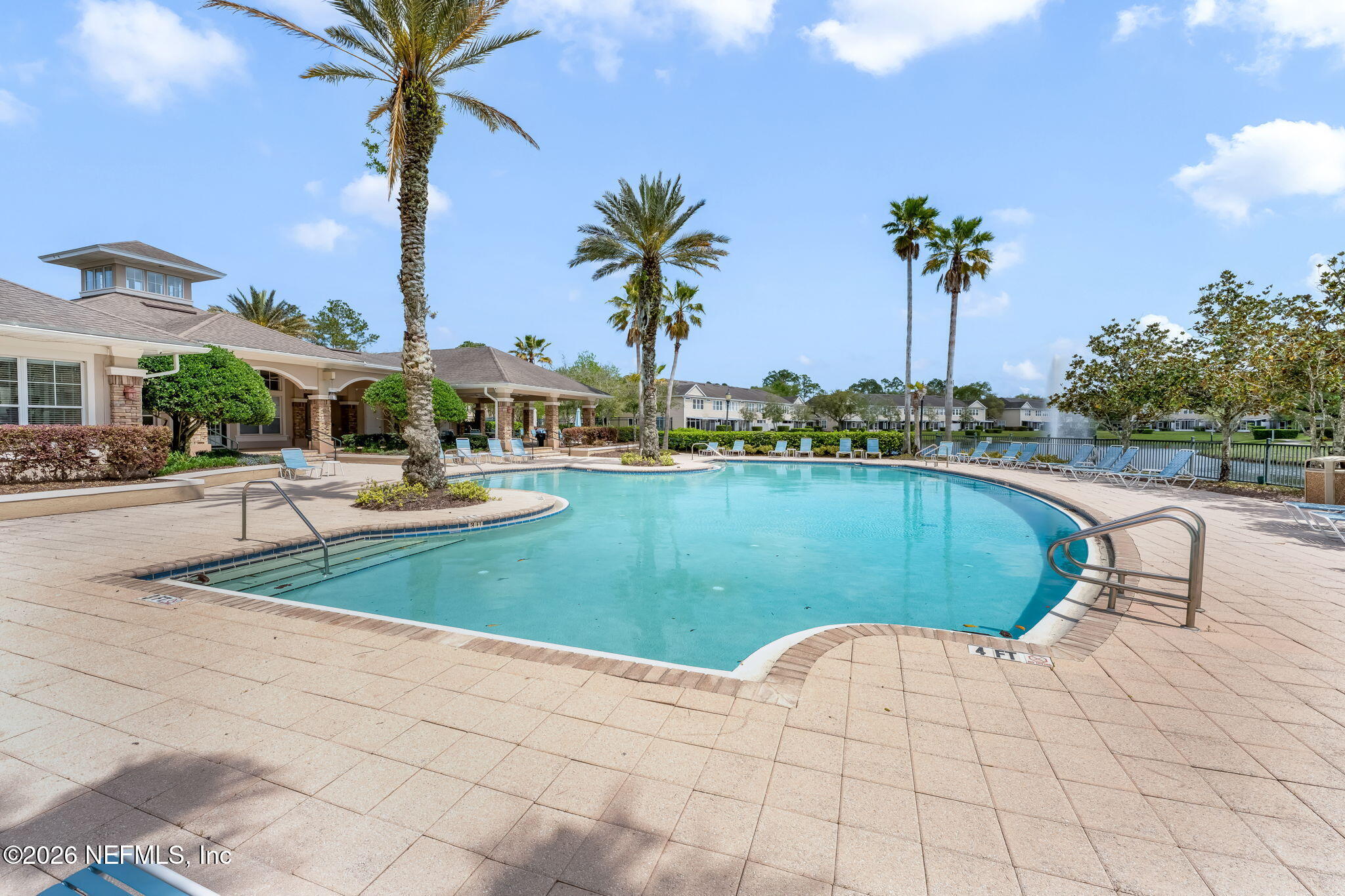 7990 Baymeadows Road East, Unit 520 Jacksonville, FL 32256 - Photo 34 of 41 a view of a swimming pool and lounge chairs