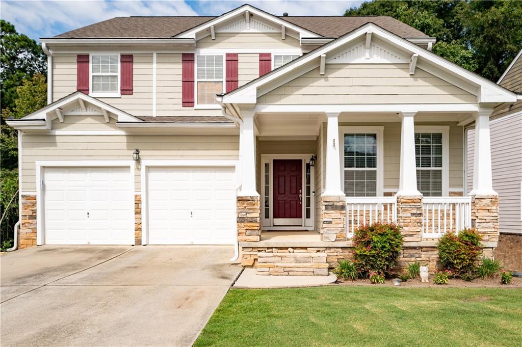 1507 Justine Way Southeast Mableton, GA 30126 - Photo 1 of 1 a front view of a house with a yard