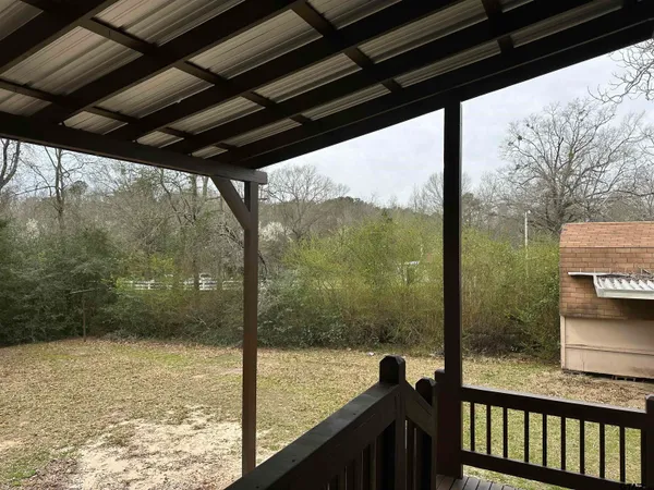 a view of a glass door with a balcony