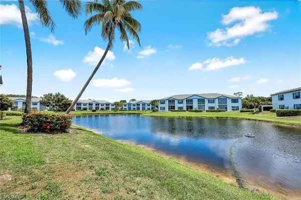 a view of a lake with a house