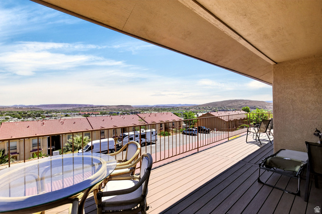 161 West 950 South, Unit Q1 St. George, UT 84770 - Photo 13 of 37 Deck with a residential view and a mountain view