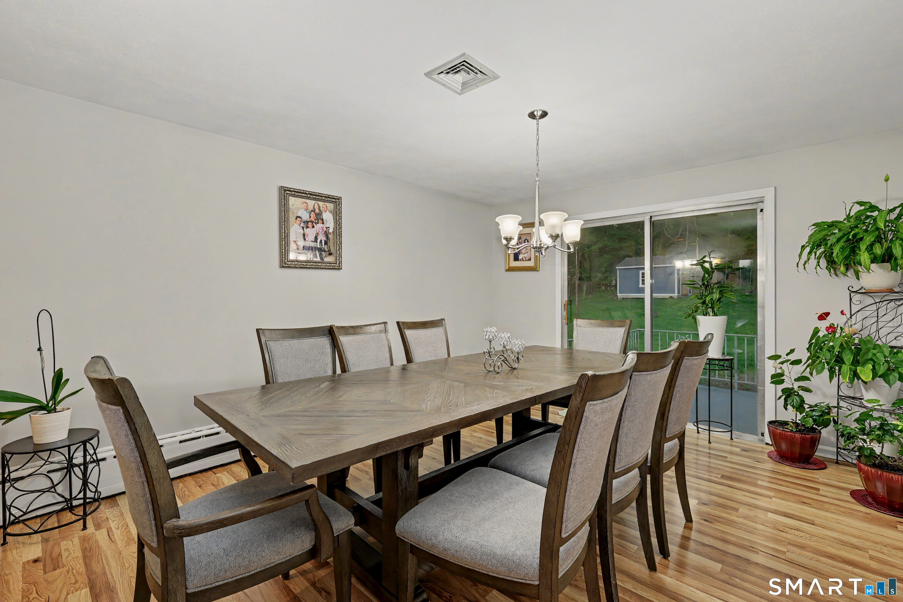 44 Haverhill Road Trumbull, CT 06611 - Photo 9 of 32 a view of a dining room with furniture window and wooden floor