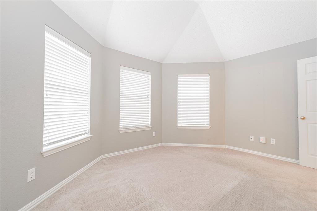 112 Midcrest Drive Irving, TX 75063 - Photo 32 of 37 an empty room with windows