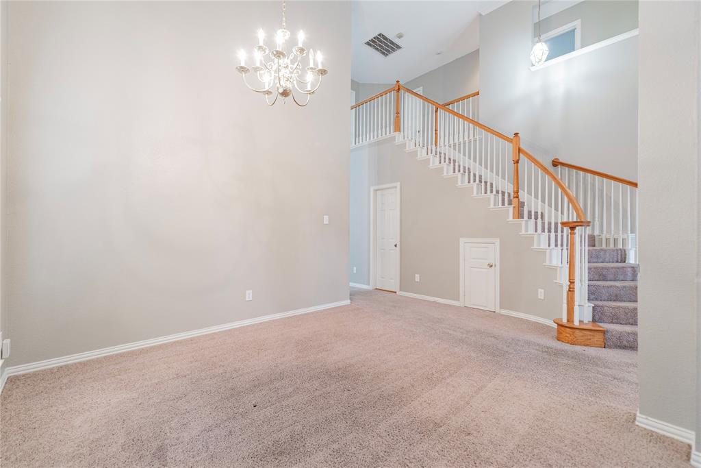 112 Midcrest Drive Irving, TX 75063 - Photo 8 of 37 a view of a hallway with staircase