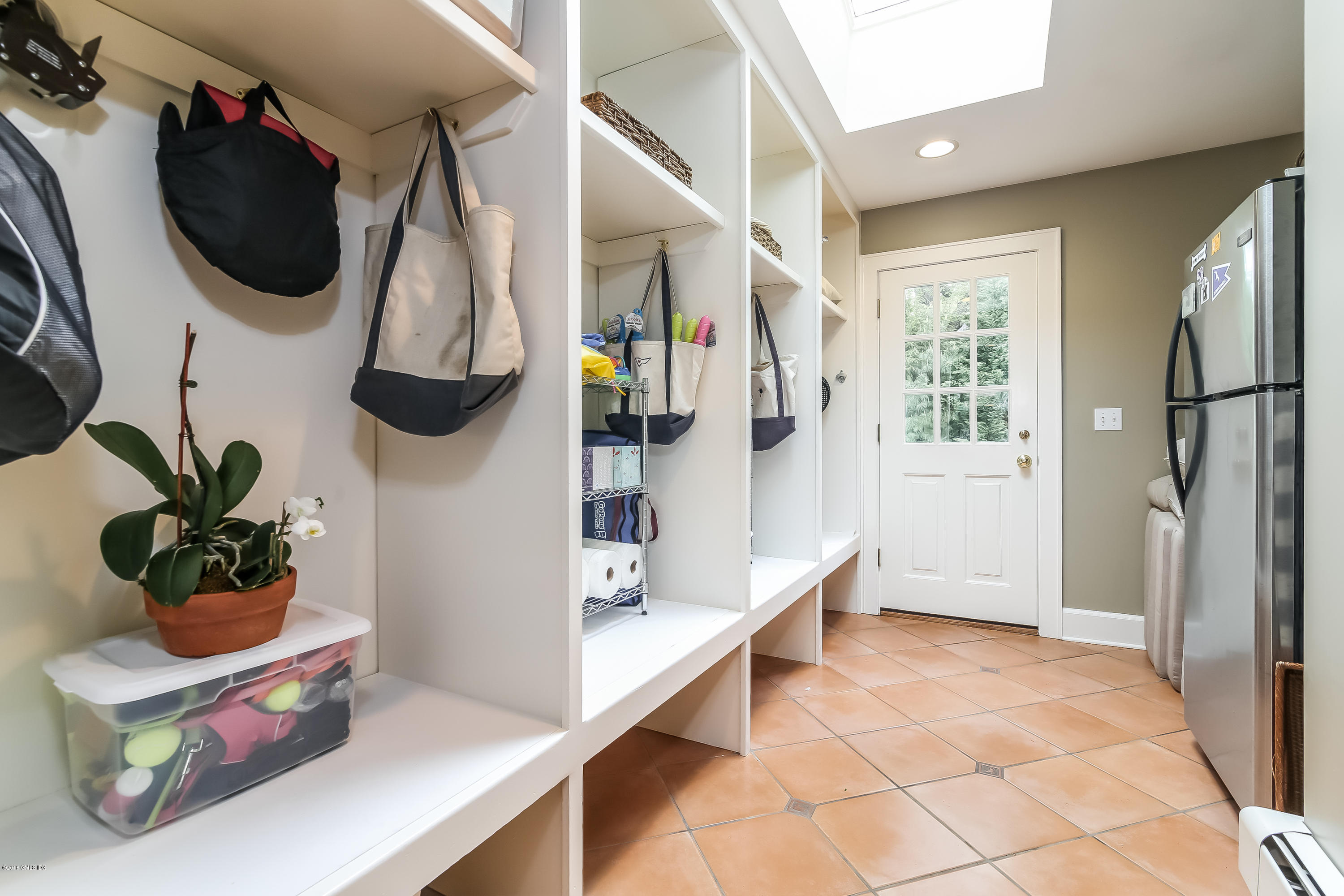 219 Riverside Avenue Riverside, CT 06878 - Photo 20 of 40 a view of a storage and utility room with two washing machine