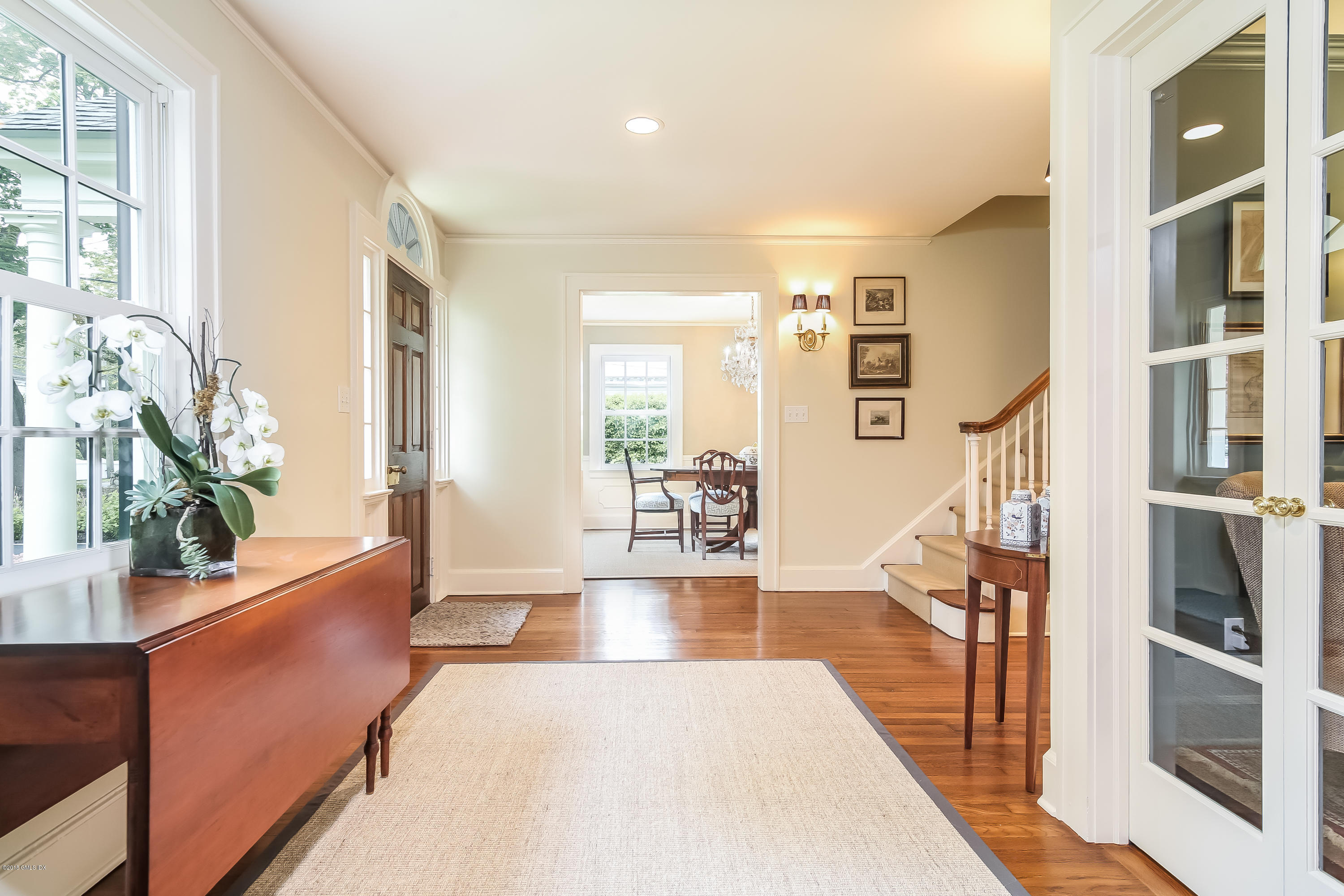 219 Riverside Avenue Riverside, CT 06878 - Photo 2 of 40 a living room with furniture and a large window