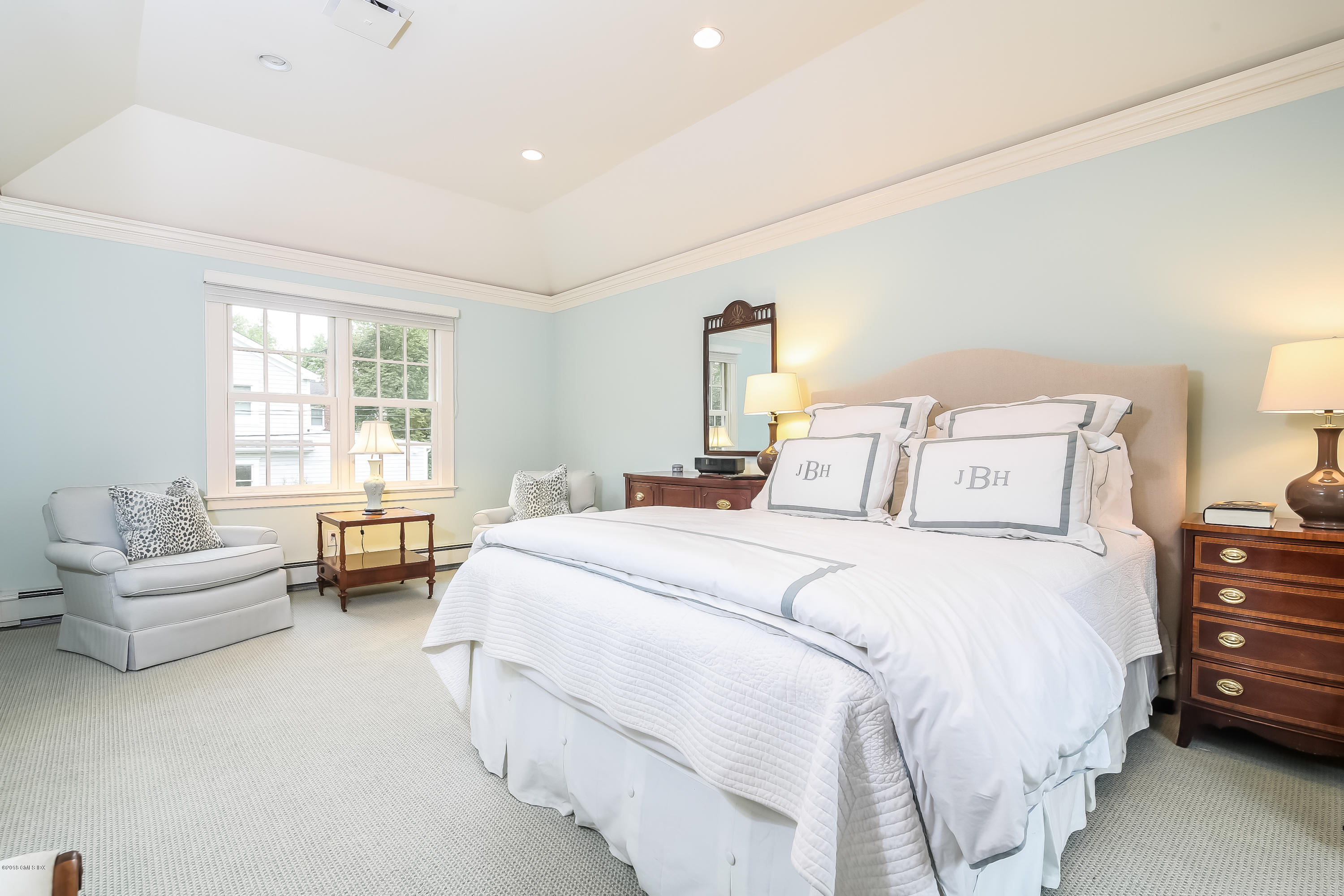 219 Riverside Avenue Riverside, CT 06878 - Photo 24 of 40 a bedroom with a bed and a couch