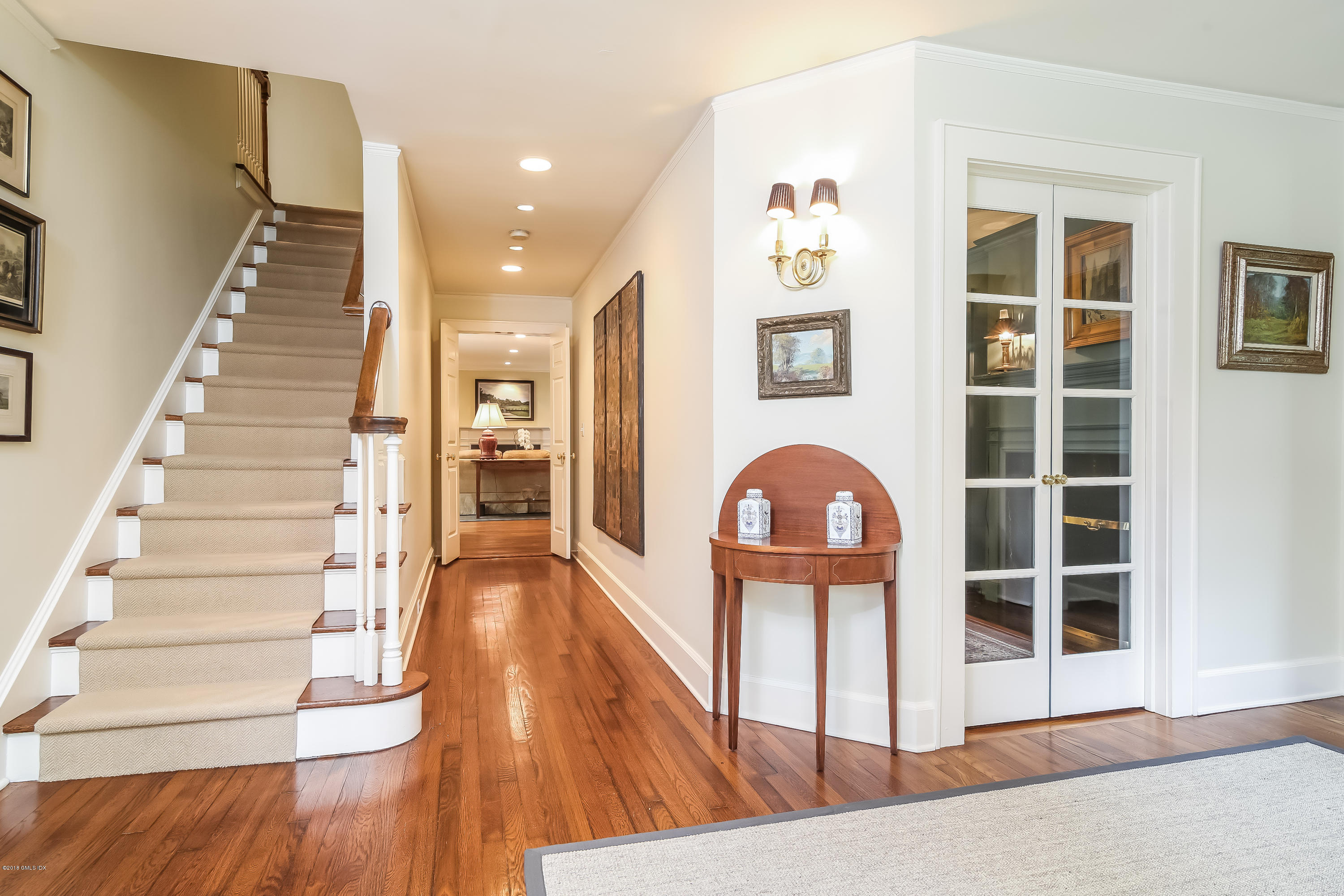 219 Riverside Avenue Riverside, CT 06878 - Photo 3 of 40 a view of entryway with wooden floor and front door