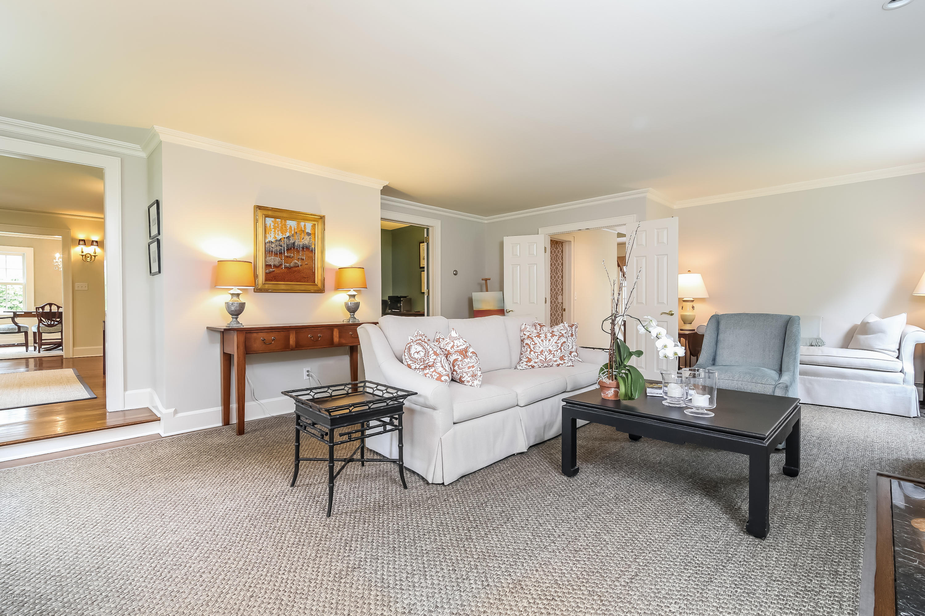 219 Riverside Avenue Riverside, CT 06878 - Photo 6 of 40 a living room with furniture and a rug