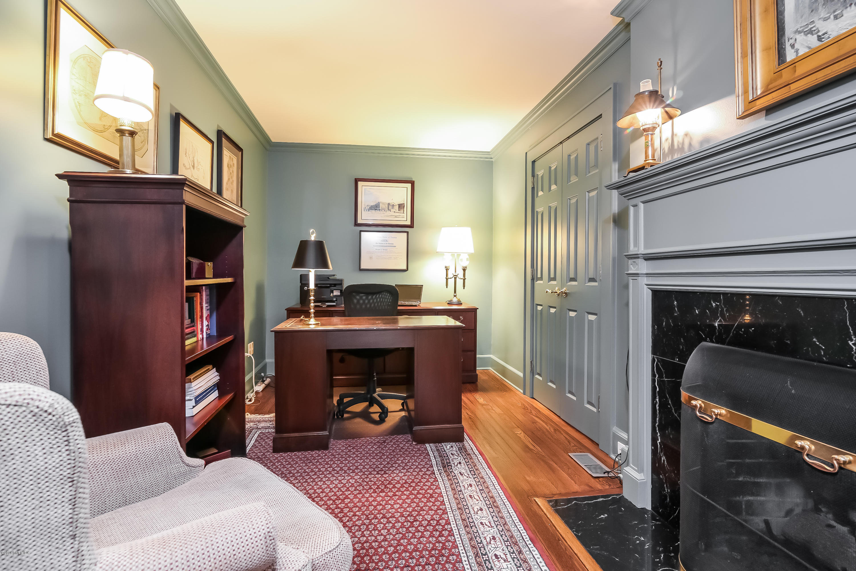 219 Riverside Avenue Riverside, CT 06878 - Photo 10 of 40 a living room with furniture and a fireplace