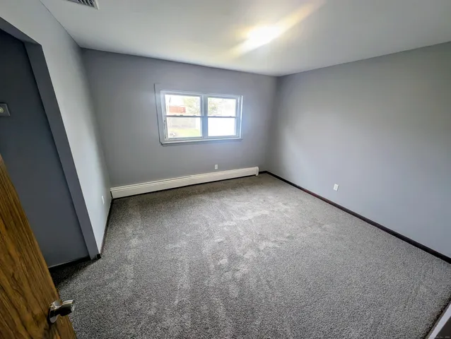 a view of hallway with stairs