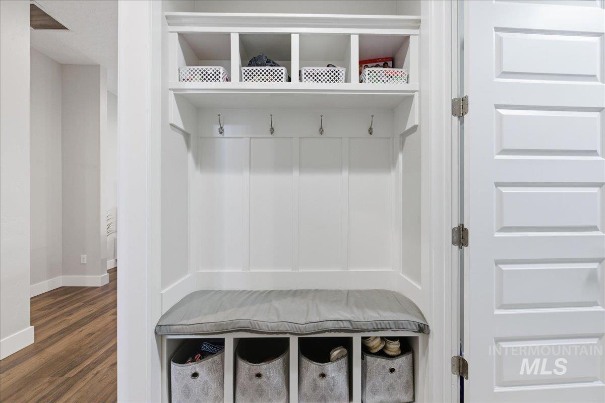5154 South Twilight Mist Way Meridian, ID 83642 - Photo 23 of 47 Mudroom with dark wood-type flooring and baseboards