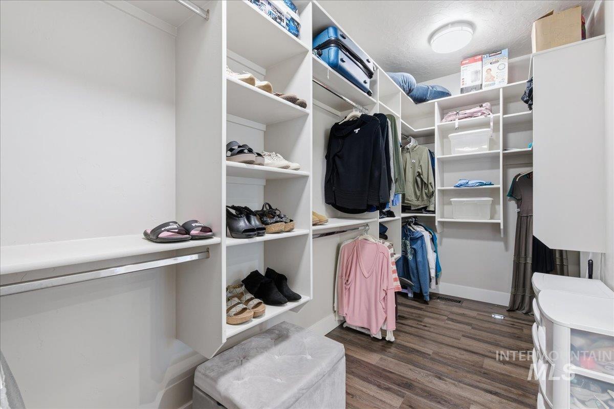 5154 South Twilight Mist Way Meridian, ID 83642 - Photo 24 of 47 Walk in closet with dark wood finished floors