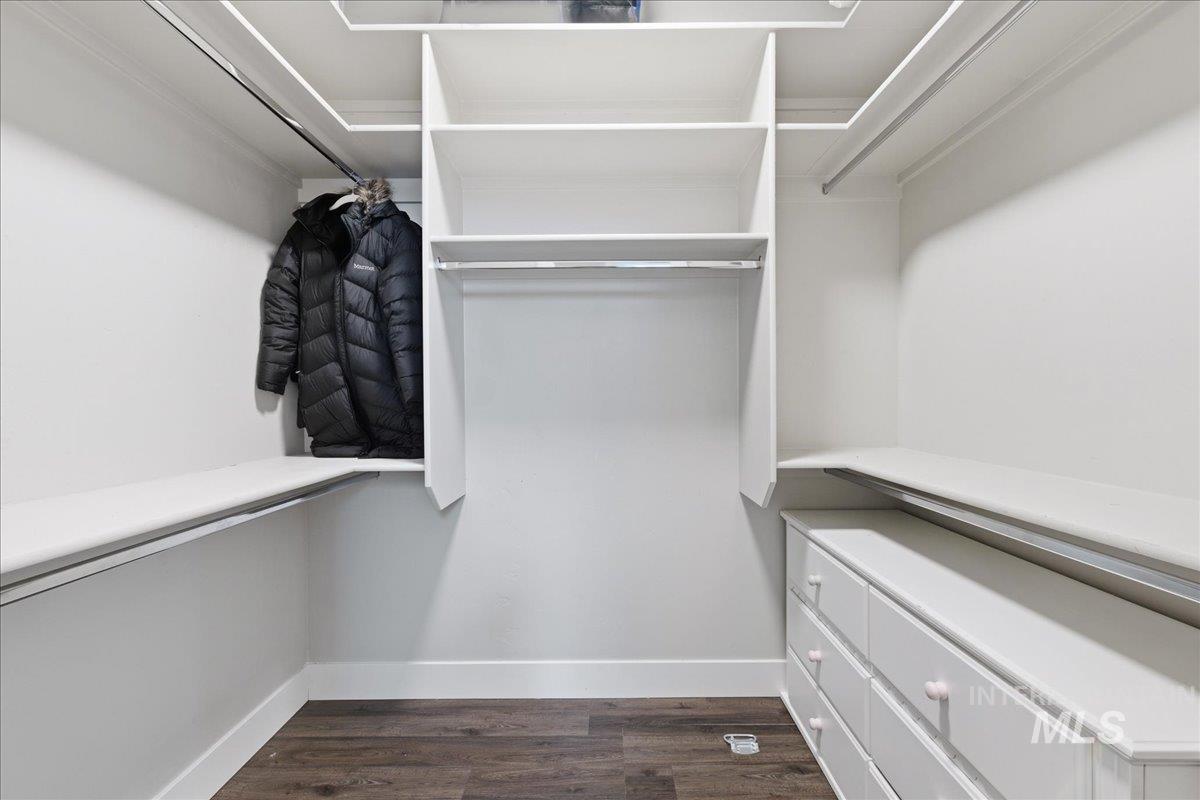 5154 South Twilight Mist Way Meridian, ID 83642 - Photo 25 of 47 Walk in closet with dark wood-style flooring