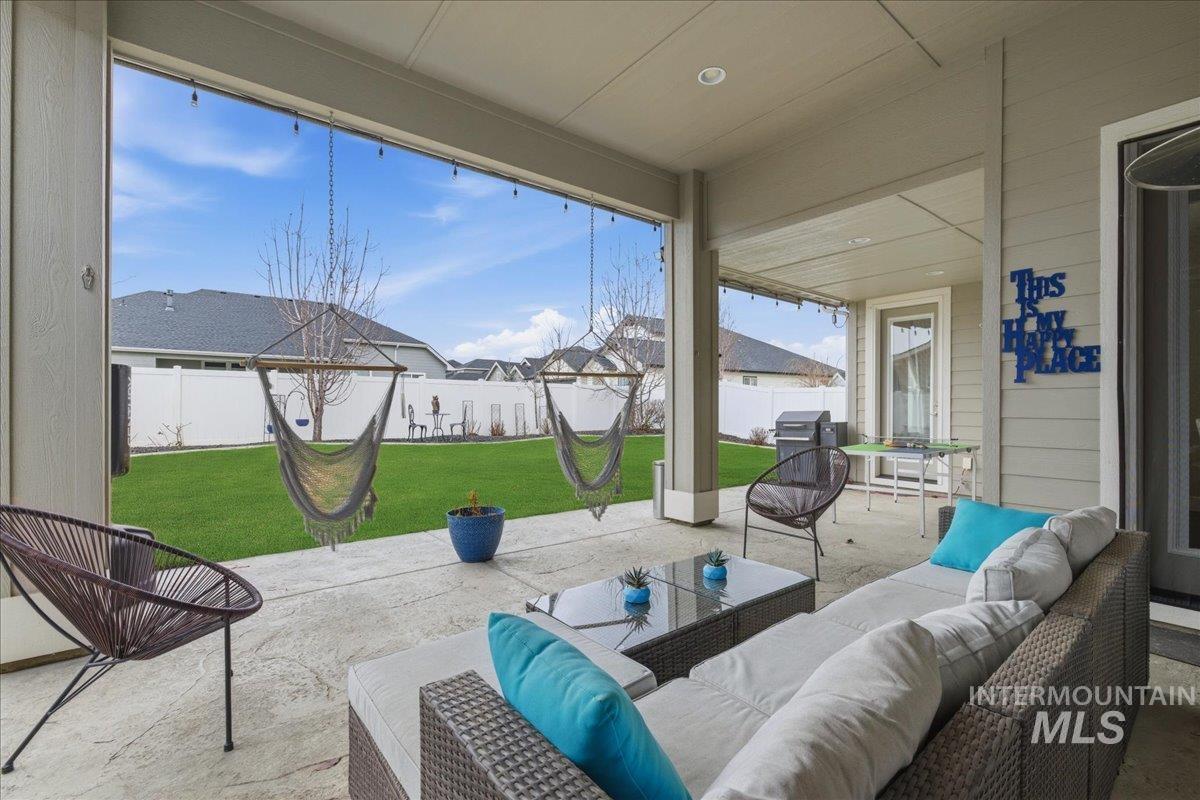 5154 South Twilight Mist Way Meridian, ID 83642 - Photo 43 of 47 Fenced backyard with a patio area and outdoor furniture