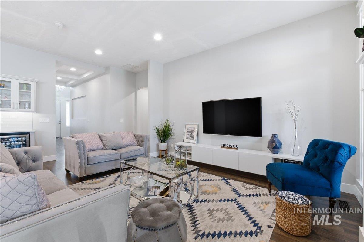 5154 South Twilight Mist Way Meridian, ID 83642 - Photo 10 of 47 Living area with dark wood-type flooring and recessed lighting