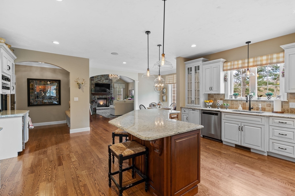 17 Applegate Road Medway, MA 02053 - Photo 11 of 42 a large kitchen with kitchen island a large island in it