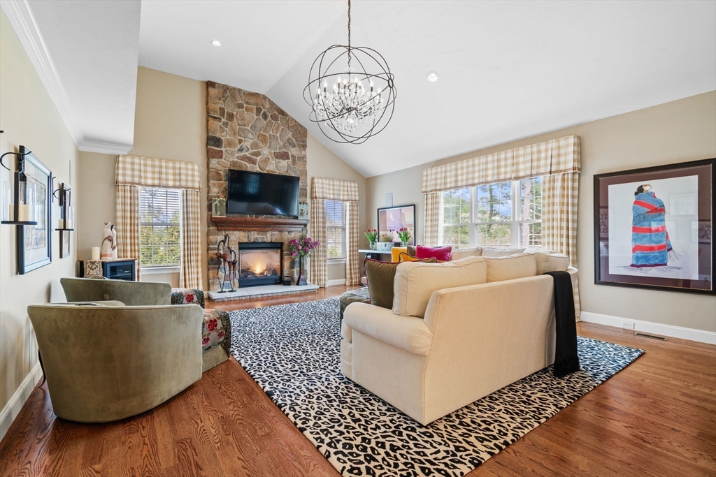 17 Applegate Road Medway, MA 02053 - Photo 15 of 42 a living room with furniture a fireplace and a large window