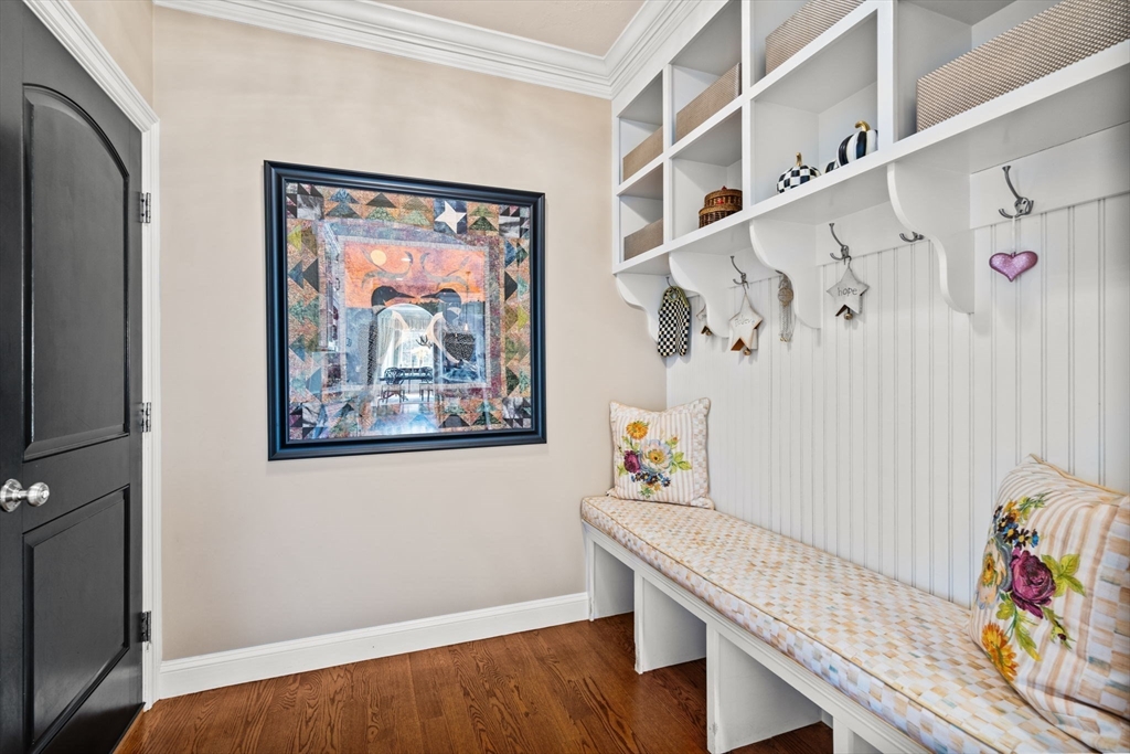 17 Applegate Road Medway, MA 02053 - Photo 20 of 42 a view of a hallway with paintings on the wall