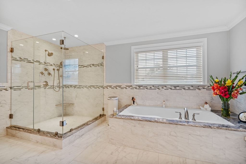 17 Applegate Road Medway, MA 02053 - Photo 31 of 42 a bathroom with a granite countertop sink a mirror and a shower