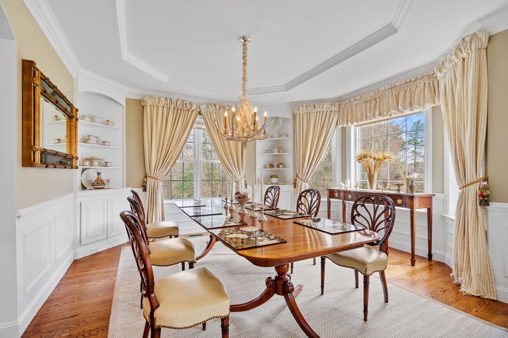 17 Applegate Road Medway, MA 02053 - Photo 8 of 42 a dining room with furniture a chandelier and wooden floor