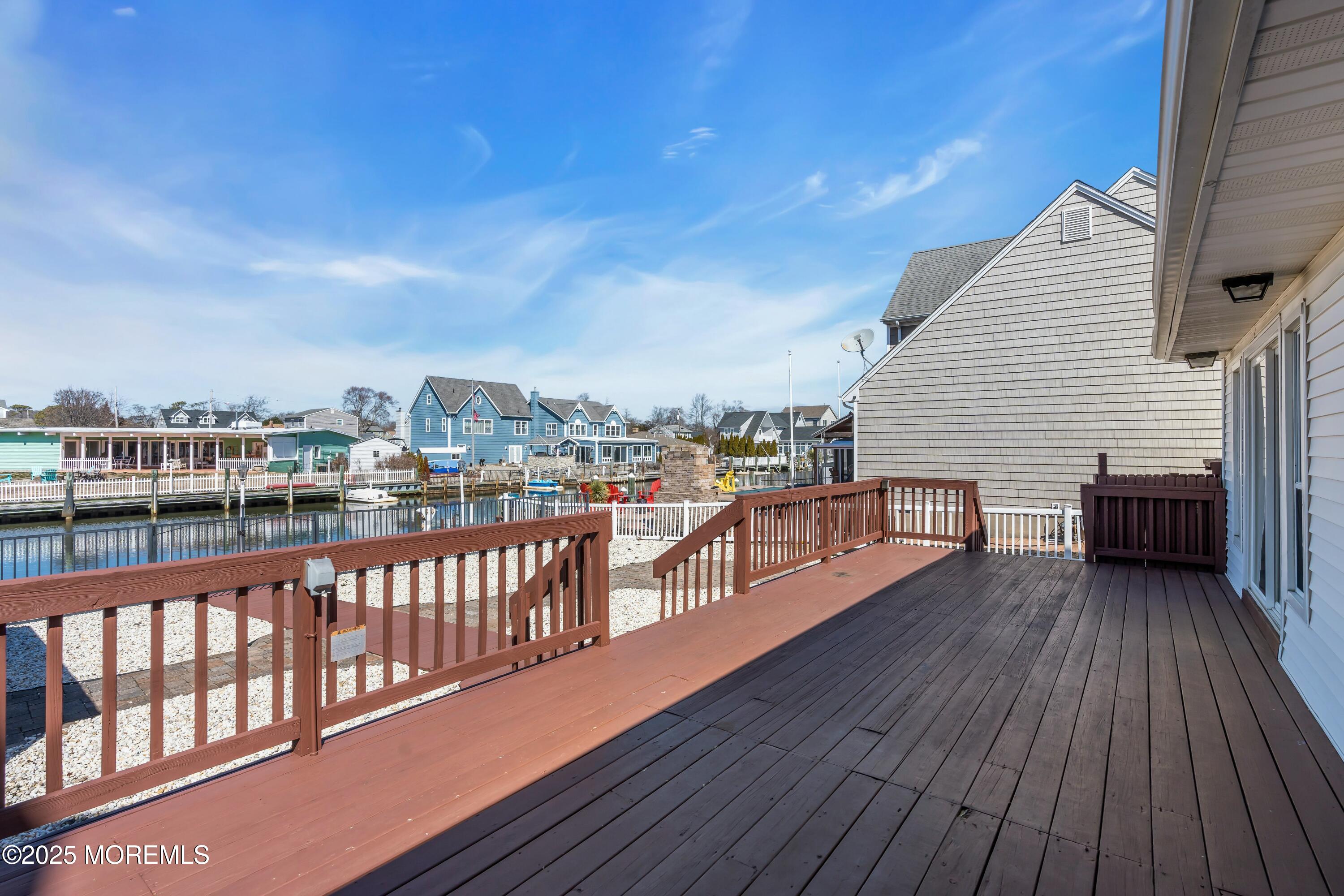 10 Commodore Drive Brick, NJ 08723 - Photo 20 of 27 a view of a balcony with wooden floor