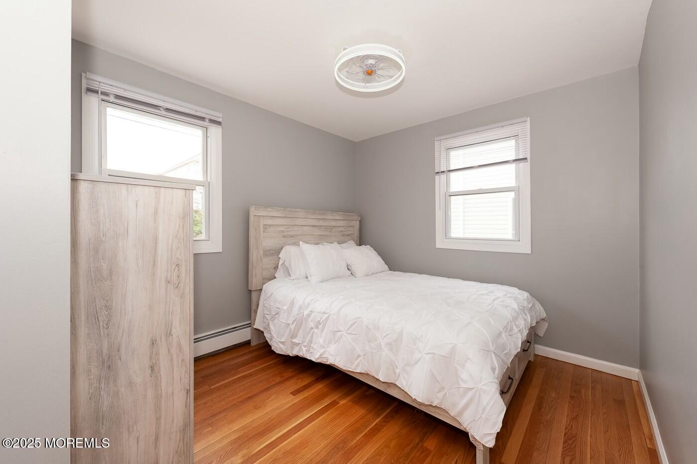 10 Commodore Drive Brick, NJ 08723 - Photo 25 of 27 a bedroom with a bed and a window