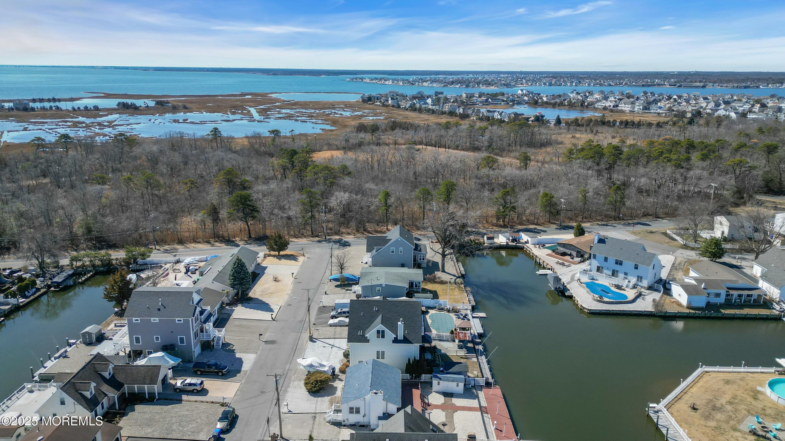 10 Commodore Drive Brick, NJ 08723 - Photo 10 of 27 an aerial view of a city with lots of residential buildings lake and ocean view